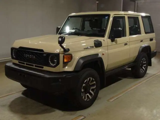 2026 Toyota Land Cruiser AX 4WD - photo 1 2026 Toyota Land Cruiser AX 4WD Brown Jeep for sale, Japanese used car export - photo 1 of 11 | GULJI TRADERS