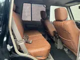 2025 Toyota Land Cruiser Prado SX Wide Black Jeep for sale, Japanese used car export - photo 5 of 9 | GULJI TRADERS
