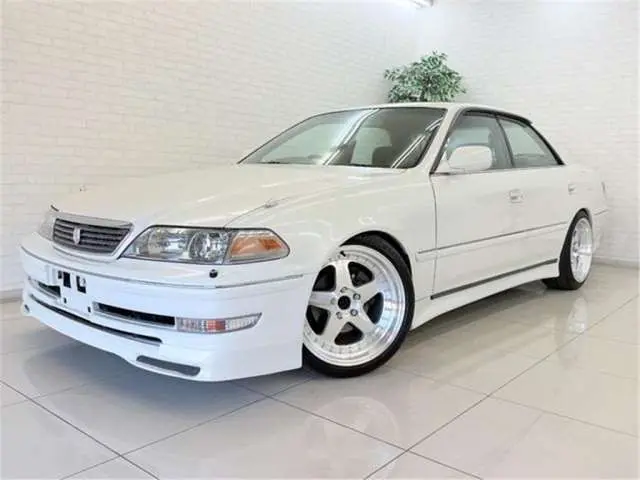 2000 Toyota Mark II Grande G with adjustable suspension and full aero kit. White Sedan for sale, Japanese used car export | GULJI TRADERS