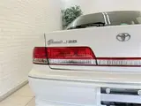 2000 Toyota Mark II Grande G with adjustable suspension and full aero kit. White Sedan for sale, Japanese used car export - photo 41 of 46 | GULJI TRADERS