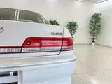 2000 Toyota Mark II Grande G with adjustable suspension and full aero kit. White Sedan for sale, Japanese used car export - photo 42 of 46 | GULJI TRADERS