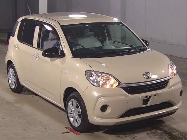 2023 Toyota Passo X Brown Sedan for sale, Japanese used car export - photo 1 of 6 | GULJI TRADERS