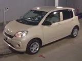 2023 Toyota Passo X Brown Sedan for sale, Japanese used car export - photo 6 of 6 | GULJI TRADERS