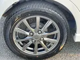 2013 Toyota Pixis Space Custom G, HID headlights, aftermarket 14-inch alloy wheels, non-smoking, navigation system, TV. White Van for sale, Japanese used car export - photo 23 of 46 | GULJI TRADERS