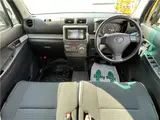 2013 Toyota Pixis Space Custom G, HID headlights, aftermarket 14-inch alloy wheels, non-smoking, navigation system, TV. White Van for sale, Japanese used car export - photo 33 of 46 | GULJI TRADERS