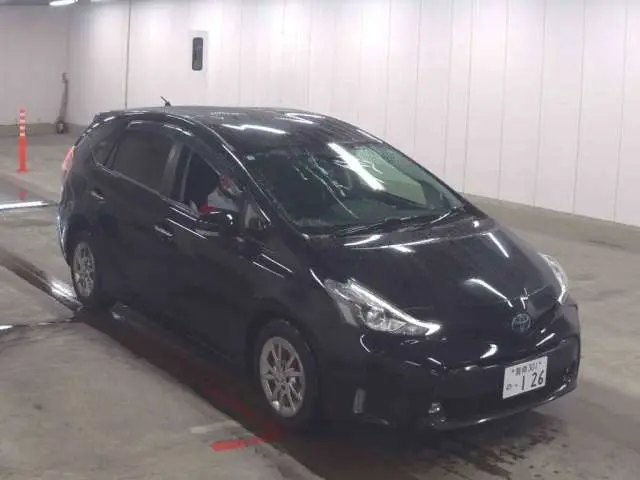 2021 Toyota Prius Alpha S Tune Black 2 - photo 1 2021 Toyota Prius Alpha S Tune Black 2 Black Van for sale, Japanese used car export - photo 1 of 3 | GULJI TRADERS