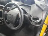 2023 Toyota Prius Phv Z Yellow Sedan for sale, Japanese used car export - photo 9 of 12 | GULJI TRADERS