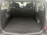 2023 Toyota Probox Hybrid F with reduced braking, navigation system, TV, backup camera, keyless entry, and automatic transmission. Black Van for sale, Japanese used car export - photo 7 of 36 | GULJI TRADERS