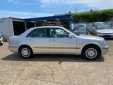 1999 Toyota Progres NC250 Silver Sedan for sale, Japanese used car export - photo 4 of 9 | GULJI TRADERS
