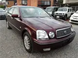 2001 Toyota Progres NC300 Walnut Package Red Sedan for sale, Japanese used car export - photo 1 of 32 | GULJI TRADERS
