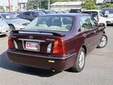 2005 Toyota Progres NC250 / Fully Automatic Passenger Seat Swivel Type A / Welcab / Rear Spoiler Brown Sedan for sale, Japanese used car export - photo 2 of 50 | GULJI TRADERS