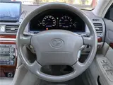 2005 Toyota Progres NC250 / Fully Automatic Passenger Seat Swivel Type A / Welcab / Rear Spoiler Brown Sedan for sale, Japanese used car export - photo 15 of 50 | GULJI TRADERS