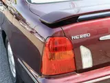 2005 Toyota Progres NC250 / Fully Automatic Passenger Seat Swivel Type A / Welcab / Rear Spoiler Brown Sedan for sale, Japanese used car export - photo 47 of 50 | GULJI TRADERS