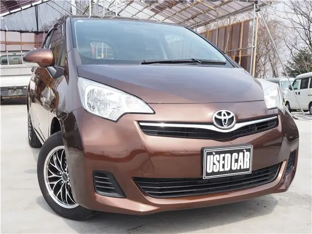 2011 Toyota Ractis 4WD Brown Van for sale, Japanese used car export - photo 1 of 44 | GULJI TRADERS