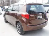 2011 Toyota Ractis 4WD Brown Van for sale, Japanese used car export - photo 2 of 44 | GULJI TRADERS