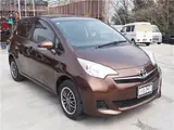 2011 Toyota Ractis 4WD Brown Van for sale, Japanese used car export - photo 5 of 44 | GULJI TRADERS
