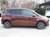 2011 Toyota Ractis 4WD Brown Van for sale, Japanese used car export - photo 7 of 44 | GULJI TRADERS