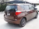 2011 Toyota Ractis 4WD Brown Van for sale, Japanese used car export - photo 8 of 44 | GULJI TRADERS