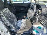 2011 Toyota Ractis X-type wheelchair vehicle, Type I White Van for sale, Japanese used car export - photo 9 of 9 | GULJI TRADERS