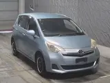 2013 Toyota Ractis G 4WD Blue Van for sale, Japanese used car export - photo 6 of 8 | GULJI TRADERS