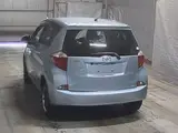 2013 Toyota Ractis G 4WD Blue Van for sale, Japanese used car export - photo 7 of 8 | GULJI TRADERS