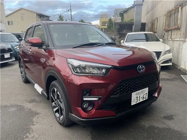 2026 Toyota Raize Hybrid Z ★BSM + RCTA★ - photo 1 2026 Toyota Raize Hybrid Z ★BSM + RCTA★ Red SUV for sale, Japanese used car export - photo 1 of 14 | GULJI TRADERS
