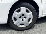 2004 Toyota Raum CPk White Sedan for sale, Japanese used car export - photo 4 of 9 | GULJI TRADERS