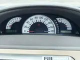 2004 Toyota Raum CPk White Sedan for sale, Japanese used car export - photo 6 of 9 | GULJI TRADERS