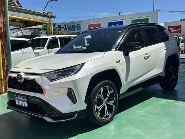2021 Toyota RAV4 Phv 2.5 Black Tone 4WD Genuine Display Audio Navigation Function - photo 1 2021 Toyota RAV4 Phv 2.5 Black Tone 4WD Genuine Display Audio Navigation Function Pearl SUV for sale, Japanese used car export - photo 1 of 32 | GULJI TRADERS