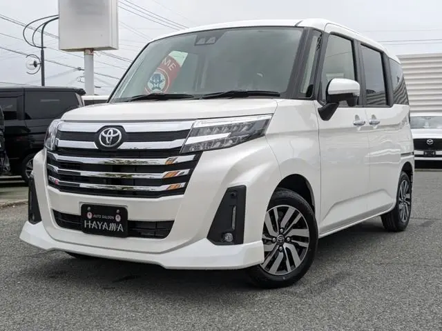 2026 Toyota Roomy 1.0 Custom G Manufacturer OP (Special Color, Comfort Package) - photo 1 2026 Toyota Roomy 1.0 Custom G Manufacturer OP (Special Color, Comfort Package) White Van for sale, Japanese used car export - photo 1 of 53 | GULJI TRADERS