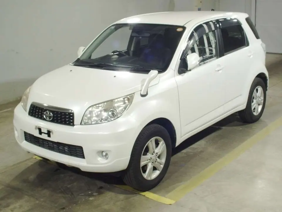 2010 Toyota Rush G 4WD Pearl SUV for sale, Japanese used car export - photo 1 of 2 | GULJI TRADERS