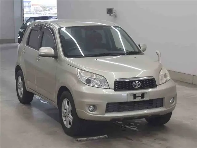 2011 Toyota Rush G Gold SUV for sale, Japanese used car export - photo 1 of 14 | GULJI TRADERS