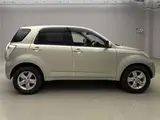 2011 Toyota Rush G Gold SUV for sale, Japanese used car export - photo 7 of 14 | GULJI TRADERS