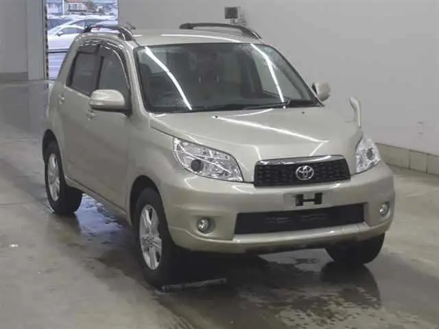 2011 Toyota Rush G Gold SUV for sale, Japanese used car export - photo 1 of 10 | GULJI TRADERS