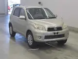 2011 Toyota Rush X Gold SUV for sale, Japanese used car export - photo 1 of 10 | GULJI TRADERS