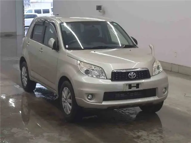 2013 Toyota Rush X - photo 1 2013 Toyota Rush X Gold SUV for sale, Japanese used car export - photo 1 of 36 | GULJI TRADERS