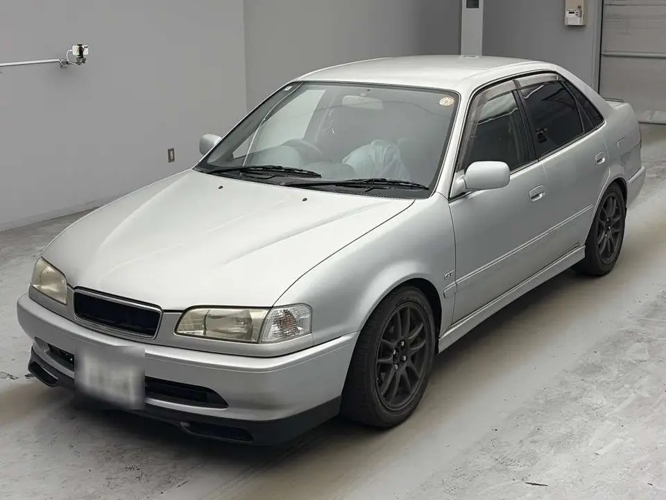 1999 Toyota Sprinter GT - photo 1 1999 Toyota Sprinter GT Silver Sedan for sale, Japanese used car export - photo 1 of 2 | GULJI TRADERS