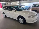 1998 Toyota Sprinter Carib Z Touring Aero Sports Package White Sedan for sale, Japanese used car export - photo 1 of 50 | GULJI TRADERS