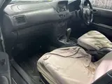 2002 Toyota Sprinter Carib S Touring Aero Sport 4WD White Sedan for sale, Japanese used car export - photo 11 of 13 | GULJI TRADERS