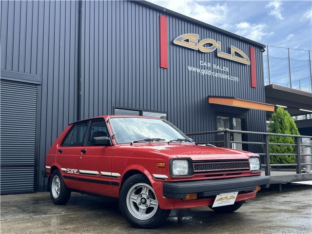 1982 Toyota Starlet S - photo 1 1982 Toyota Starlet S Red Sedan for sale, Japanese used car export | GULJI TRADING