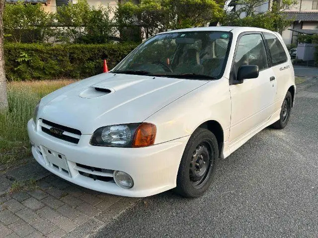 1996 Toyota Starlet Glanza V - photo 1 1996 Toyota Starlet Glanza V White Sedan for sale, Japanese used car export - photo 1 of 24 | GULJI TRADERS