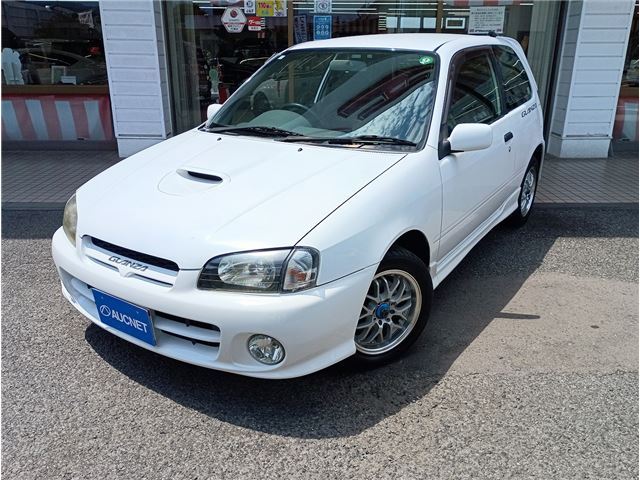 1999 Toyota Starlet Glanza V White Sedan for sale, Japanese used car export | GULJI TRADERS