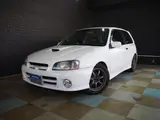 1999 Toyota Starlet Glanza V White Sedan for sale, Japanese used car export - photo 1 of 9 | GULJI TRADERS
