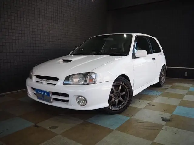 1999 Toyota Starlet Glanza V White Sedan for sale, Japanese used car export | GULJI TRADERS