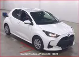 2021 Toyota Yaris White Sedan for sale, Japanese used car export - photo 1 of 2 | GULJI TRADERS