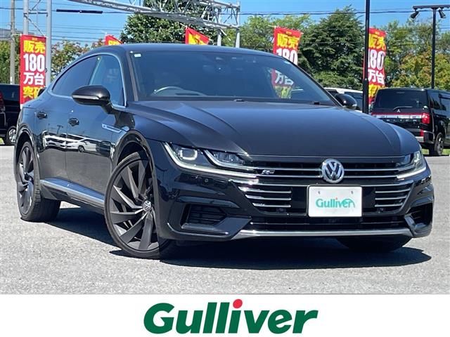 2018 Volkswagen Arteon Arteon R-Line 4M Advance 4WD - photo 1 2018 Volkswagen Arteon Arteon R-Line 4M Advance 4WD Black Sedan for sale, Japanese used car export | GULJI TRADERS
