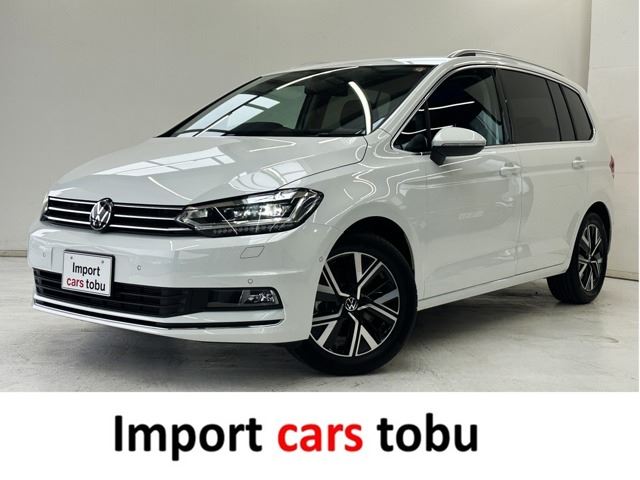 2025 Volkswagen Golf Touran TSI - photo 1 2025 Volkswagen Golf Touran TSI Sedan for sale, Japanese used car export | GULJI TRADERS