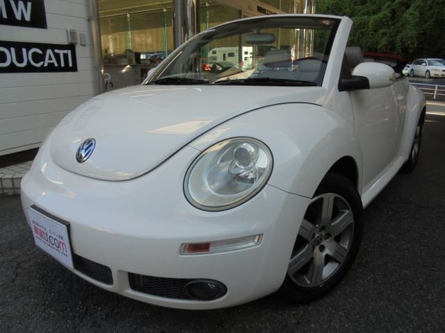 2009 Volkswagen NEW Beetle Cabriolet LZ - photo 1 2009 Volkswagen NEW Beetle Cabriolet LZ Coupe for sale, Japanese used car export - photo 1 of 39 | GULJI TRADERS